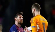 Barcelona's Lionel Messi and Manchester United's David de Gea after the match. Reuters/Susana Vera