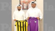 Officials of Muaither SC and Qatar SC pose with their respective clubs jerseys ahead of QNB Stars League play-off match at the Al Duhail Stadium which will take place today.
