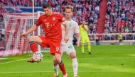 Bayern Munich's Polish forward Robert Lewandowski and Bremen's German defender Sebastian Langkamp vie for the ball during the German first division Bundesliga football match FC Bayern Munich vs SV Werder Bremen on April 21, 2019 in Munich. AFP / Guenter S