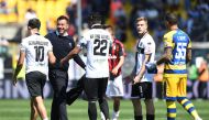 Parma coach Roberto D'Aversa and Parma's Nicolas Schiappacase after the match REUTERS/Jennifer Lorenzini