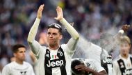 Juventus' Cristiano Ronaldo celebrates winning the league after the match REUTERS/Massimo Pinca