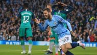 Manchester City's Portuguese midfielder Bernardo Silva celebrates scoring his team's second goal during the UEFA Champions League quarter final second leg football match between Manchester City and Tottenham Hotspur at the Etihad Stadium in Manchester, no