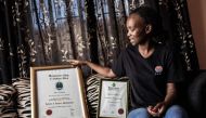 Kgomotso Sebabi, a South African unemployed graduate speaks about the lack of job opportunities at her house in Soweto, Johannesburg on April 3, 2019. AFP / Gianluigi Guercia 