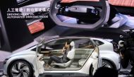 A designer presents an Audi AI:me concept car during an unveiling event in Shanghai, China April 15, 2019. Reuters/Norihiko Shirouzu