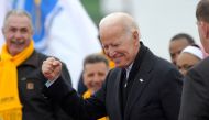 In this file photo taken on April 18, 2019 Former US vice president Joe Biden leaves a rally organized by UFCW Union members to support Stop and Shop employees on strike throughout the region at the Stop and Shop in Dorchester, Massachusetts.  / AFP / JOS