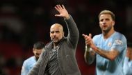 Manchester City manager Pep Guardiola and Manchester City's Kyle Walker after the match Action Images via Reuters/Carl Recine