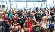 People wait as SAS pilots go on strike at Oslo Airport in Gardermoen, Norway April 26, 2019. NTB Scanpix/Ole Berg-Rusten via REUTERS