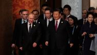 Russian President Vladimir Putin and Chinese President Xi Jinping arrive for a welcoming banquet, after the welcome ceremony of leaders attending the Belt and Road Forum at the Great Hall of the People in Beijing, China April 26, 2019. Nicolas Asfouri/Poo