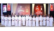 Senior management of Qatar Steel with the long -serving employees.
