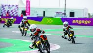 Children taking part in the End Season On Road races at Losail Circuit Sports Club.