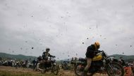 In a photo taken on April 28, 2019, participants compete in the annual Dust Race in Chungju. AFP / Ed JONES