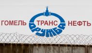 A storage tank is seen at the Gomeltransneft oil pumping station, which moves crude through the Druzhba pipeline westwards to Europe, near Mozyr, some 300 km (186 miles) southeast of Minsk, September 11, 2013. Reuters/Vasily Fedosenko 