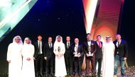 The 2018-19 Qatar Football Association Award winners pose for a photograph at the Qatar National Convention Centre Theatre in Doha’s Education City yesterday.  