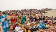 Folk artists play traditional music for tourists at Kashgar, Xinjiang Uighur Autonomous Region, China,  May 2, 2016. Reuters
