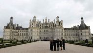 French President Emmanuel Macron, his wife Brigitte Macron, Italian President Sergio Mattarella and his daughter Laura Mattarella walk in the gardens of Chambord Castle following commemorations of the 500th anniversary of the death of Italian Renaissance 