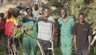Members of Komb Green Solutions pose for a picture in Korogocho, Kenya on March 27, 2019. Thomson Reuters Foundation/Thomas Bwire
