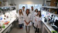 Marina Simian (C), a medical researcher, poses for a picture with members of her team, in Buenos Aires, Argentina May 9, 2019. Reuters/Agustin Marcarian