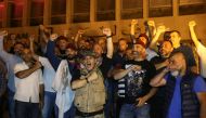 Retired soldiers gesture as they take part in a protest over proposed cuts to the cost of military pensions and benefits in front of the central bank in Beirut, Lebanon May 12, 2019. Reuters/Mohamed Azakir