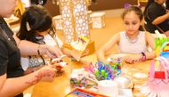 The children engaged in various activities at Mall of Qatar.