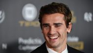 FILE PHOTO: Atletico Madrid's French forward Antoine Griezmann poses upon arrival at the 2018 Ballon d'Or award ceremony at the Grand Palais in Paris. AFP / FRANCK FIFE
