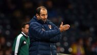 In this file photo manager of the Croatian national football team Igor Stimac gestures during the 2014 World Cup, Group A qualifying football match between Scotland and Croatia at Hampden Park in Glasgow.