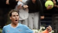 Rafael Nadal of Spain celebrates after winning against Greece's Stefanos Tsitsipas during their ATP Masters tournament semi final tennis match at the Foro Italico camp in Rome, on May 18, 2019. (AFP / Filippo MONTEFORTE)