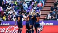 Valencia's Spanish forward Rodrigo Moreno (2R) celebrates with teammates after scoring during the Spanish League football match between Real Valladolid and Valencia at the Jose Zorrilla stadium in Valladolid on May 18, 2019. / AFP / OSCAR DEL POZO