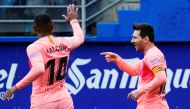 Barcelona's Lionel Messi celebrates scoring their first goal with Malcom REUTERS/Vincent West