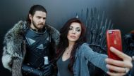 A woman shoots a selfie with an actor, dressed like Jon Snow, before the screening of final episode of Game of Thrones on 20-meter-high screen at RZD Arena in Moscow, Russia May 20, 2019. REUTERS/Maxim Shemetov