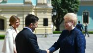 Ukraine's President Volodymyr Zelensky (2nd L) shakes hands with President of Lithuania, Dalia Grybauskaite (R) following his inauguration ceremony at the Ukrainian Parliament in Kiev, Ukraine on May 20, 2019. 