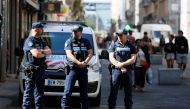 Police patrol the streets during the manhunt of a suspected suitcase bomber in central Lyon, France, May 25, 2019. REUTERS/Emmanuel Foudrot