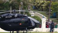 Brazil's Neymar arrives by helicopter at the training ground REUTERS/Pilar Olivares