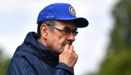 Chelsea's Italian head coach Maurizio Sarri attends a training session at Chelsea Training Ground, in Cobham, Surrey on May 22, 2019, ahead of their Europa League final football match against Arsenal on May 29. / AFP / Ben STANSALL