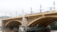 A Hungarian army boat passes under Margaret Bridge after a ship accident that killed several people on the Danube river in Budapest, Hungary, May 30, 2019. REUTERS/Bernadett Szabo