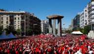 General view of Liverpool fans playing with a ball in a fan zone REUTERS/Juan Medina
 