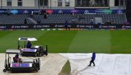 Groudstaff remove the covers as rain delays play ahead the 2019 Cricket World Cup group stage match between Pakistan and Sri Lanka at Bristol County Ground in Bristol, southwest England, on June 7, 2019. AFP / Saeed Khan