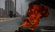 Sudanese protesters burn tyres and set up barricades on roads to army headquarters after the intervention of Sudanese army, during a demonstration in Khartoum, Sudan on June 3, 2019. Mahmoud Hjaj - Anadolu