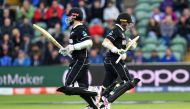 New Zealand's captain Kane Williamson (L) and New Zealand's Tom Latham run between wickets during the 2019 Cricket World Cup group stage match between Afghanistan and New Zealand at The County Ground in Taunton, southwest England, on June 8, 2019. AFP / S