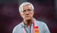 China's coach Marcello Lippi looks on during China's football friendly match against Tajikistan in Guangzhou, in China's southern Guangdong province on June 11, 2019. China OUT / AFP 