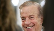 FILE PHOTO: Italy's film director Franco Zeffirelli smiles during a ceremony at the British Embassy in Rome November 24, 2004. REUTERS/Tony Gentile