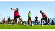 Qatari midfielder Karim Boudiaf (centre) takes part in a training session along with his team-mates in Rio de Janeiro ahead of their opening match of the 2019 Copa America against Paraguay, which will be played at the historic Maracana Stadium today.