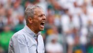 FILE PHOTO: Borussia Dortmund coach Lucien Favre reacts REUTERS/Wolfgang Rattay
