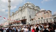 People attend a symbolic funeral prayer for the former Egyptian president Mohamed Mursi at the courtyard of Fatih Mosque in Istanbul, Turkey, June 18, 2019. REUTERS/Murad Sezer