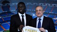 French defender Ferland Mendy (L) and Real Madrid's president Florentino Perez pose during the official presentation of the footballer as new player of the Spanish club at the Santiago Bernabeu stadium in Madrid on June 19, 2019. / AFP / OSCAR DEL POZO