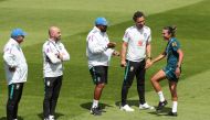 Brazil's Marta with the coaching staff during training REUTERS/Yves Herman