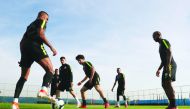 Qatari players take part in a practice session in Porto Alegre, Brazil yesterday, on the eve of their Copa America match against Argentina.