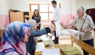 A woman votes at a polling station in Istanbul during the mayoral election on June 23, 2019. AFP / GURCAN OZTURK
