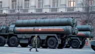 FILE PHOTO: A Russian serviceman walks past S-400 missile air defence systems before a parade marking the anniversary of the victory over Nazi Germany in World War Two, in central Moscow, Russia April 29, 2019. REUTERS/Tatyana Makeyeva