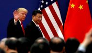 File photo of U.S. President Donald Trump and China's President Xi Jinping meet business leaders at the Great Hall of the People in Beijing, China, November 9, 2017. REUTERS/Damir Sagolj/File Photo