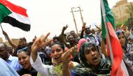 :People shout slogans as they march on the streets demanding the ruling military hand over to civilians during a demonstration in Khartoum, Sudan June 30, 2019. (REUTERS/Umit Bektas)